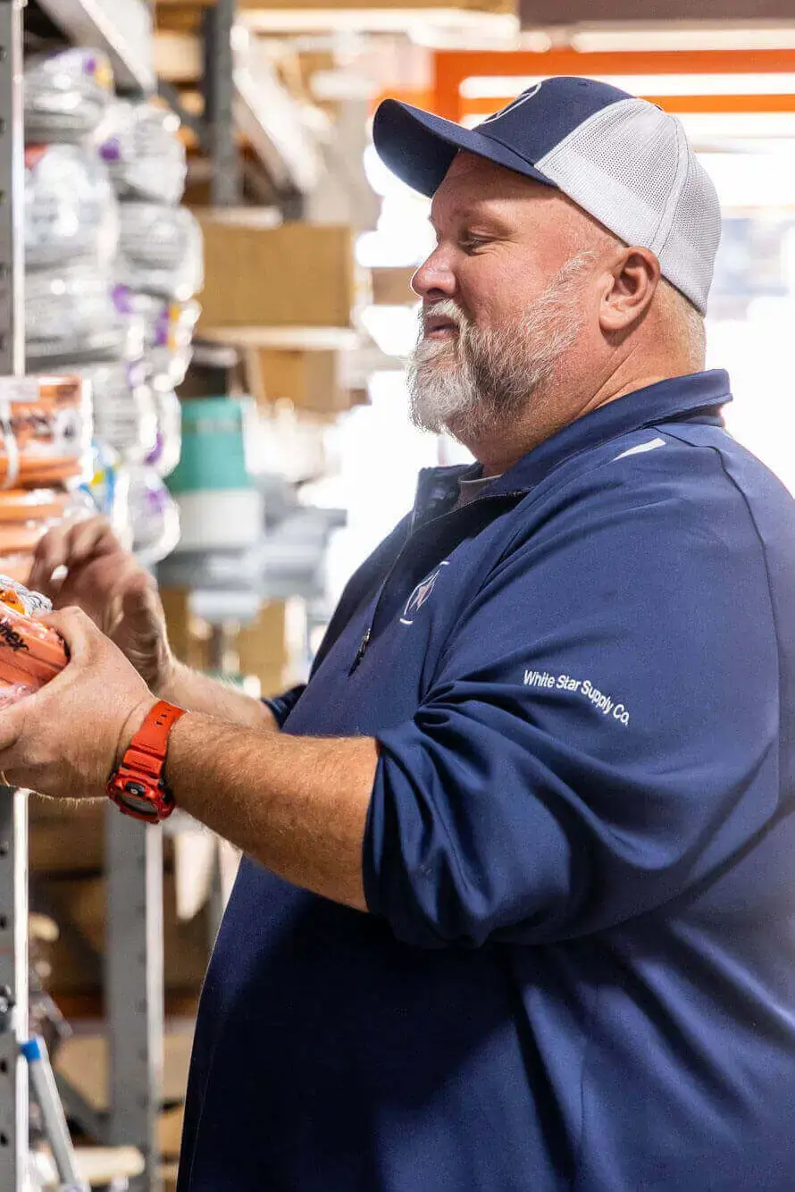 Photo of a White Star contractor team member working.